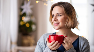 Claudia Hammond Christmas wellbeing tips woman smiling cup coffee